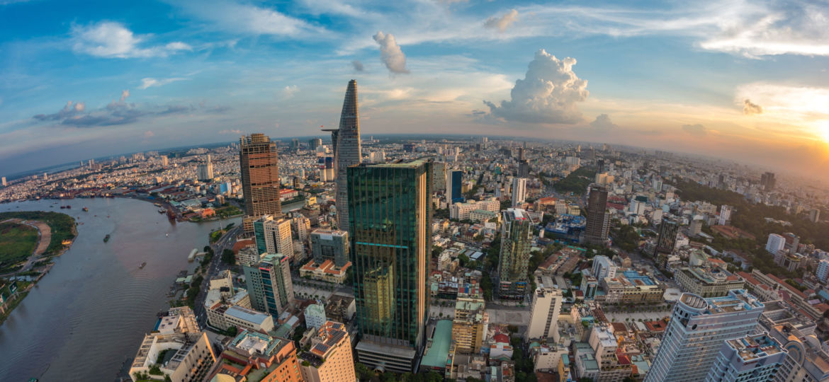 HO CHI MINH, VIETNAM - NOV 20, 2017: Royalty high quality stock image aerial view of Ho Chi Minh city, Vietnam. Beauty skyscrapers along river light smooth down urban development in Ho Chi Minh City